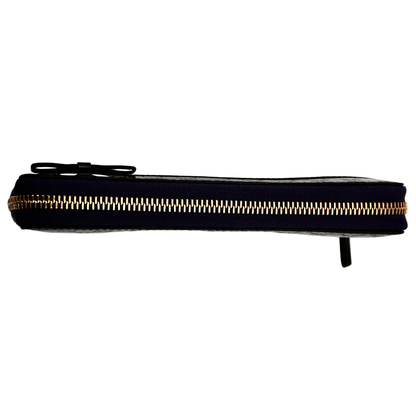 Cartera Gucci Guccissima Mordado