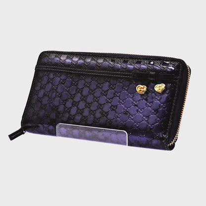 Cartera Gucci Guccissima Mordado