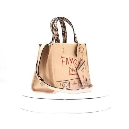 Bolsa y Cartera Coach Famous
